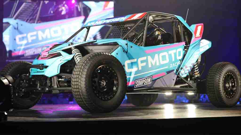 VanEperen Racing CFMOTO Z10 powers through a dirt corner beneath the headline “Has CFMOTO Put Polaris on Notice?”