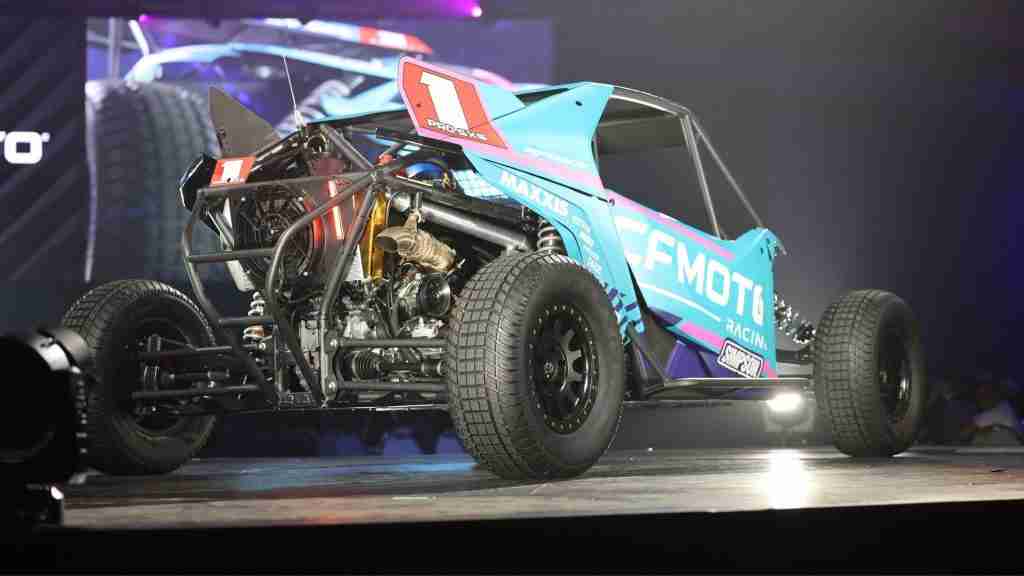 VanEperen Racing CFMOTO Z10 powers through a dirt corner beneath the headline “Has CFMOTO Put Polaris on Notice?”