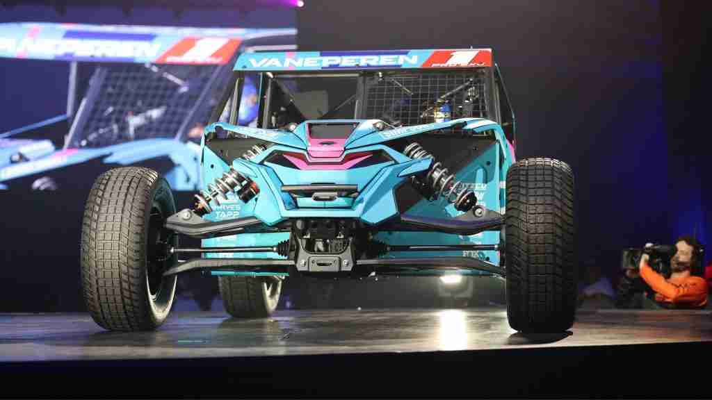 VanEperen Racing CFMOTO Z10 powers through a dirt corner beneath the headline “Has CFMOTO Put Polaris on Notice?”