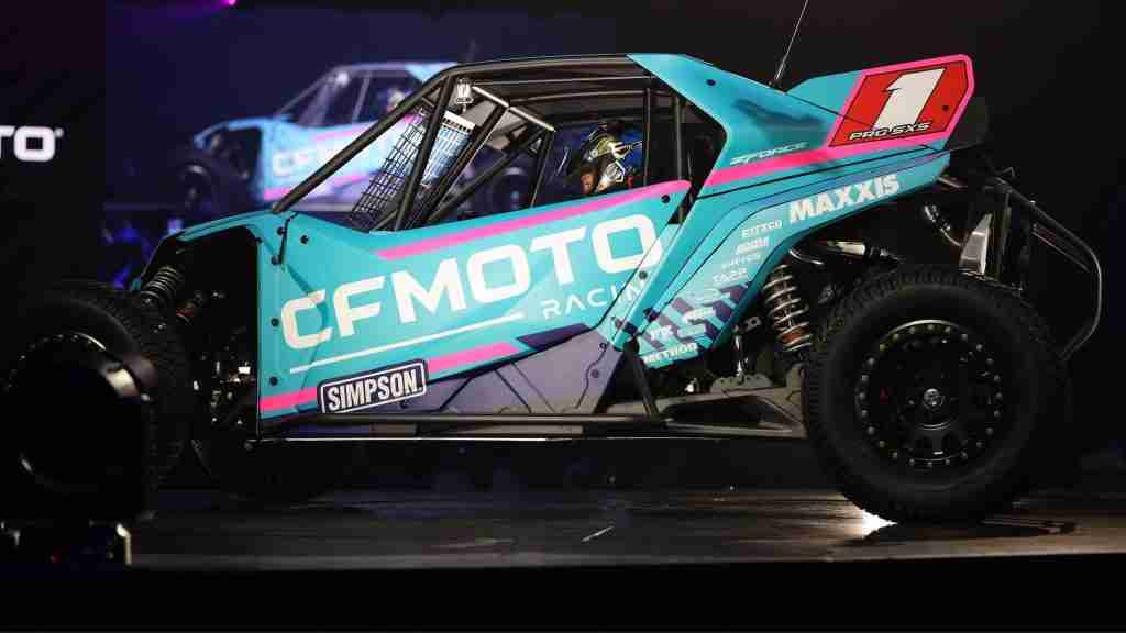 VanEperen Racing CFMOTO Z10 powers through a dirt corner beneath the headline “Has CFMOTO Put Polaris on Notice?”